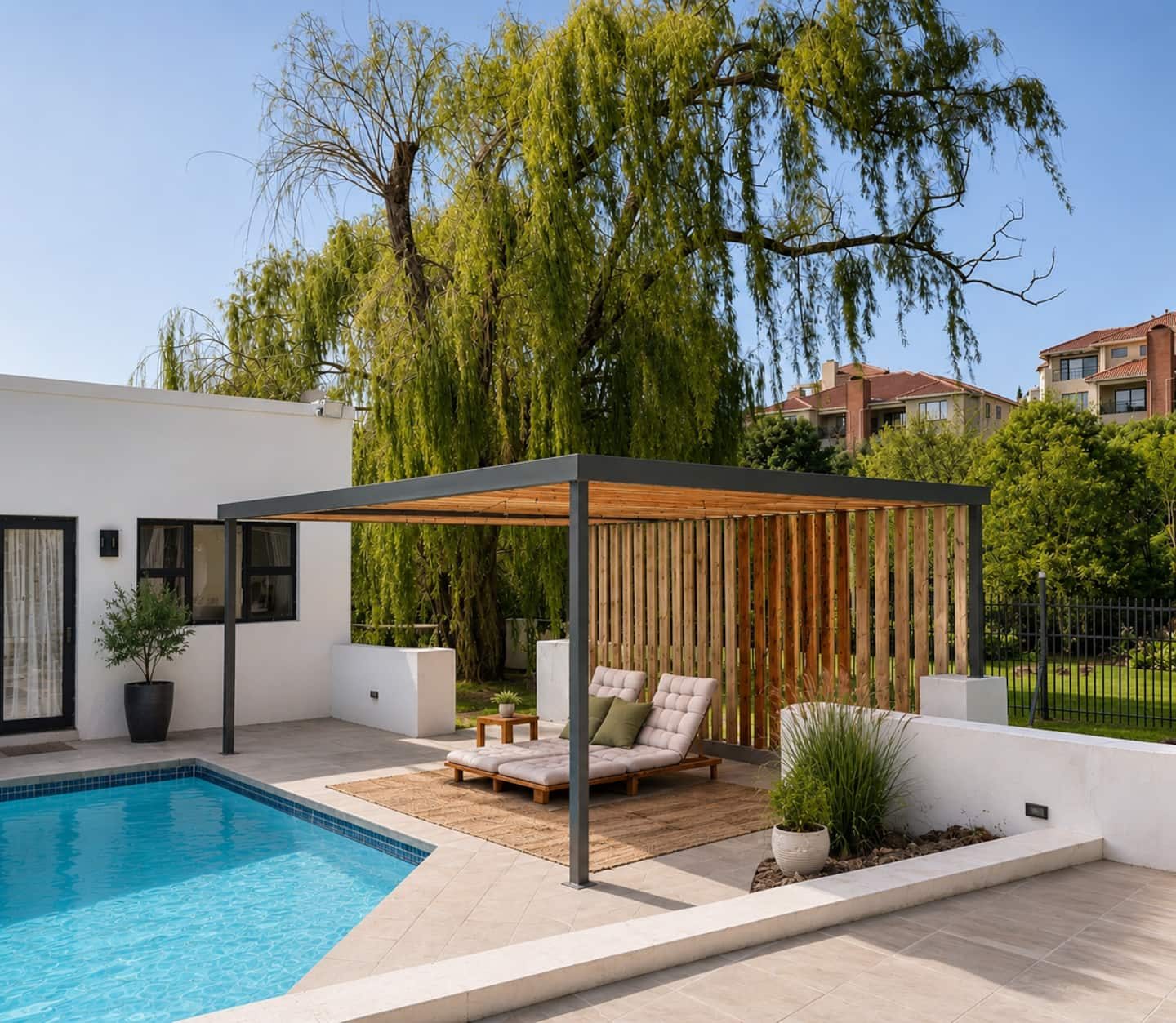 Pool deck with pergola and loungers