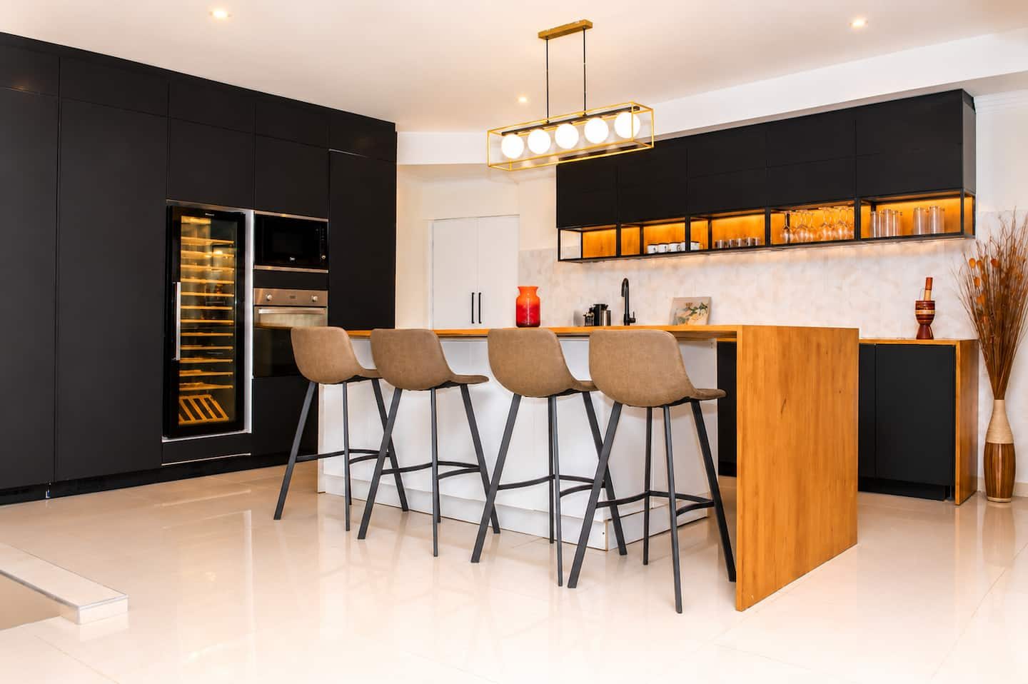 Kitchen with island and bar stools